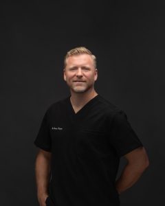 Dr. Travis Fisher certified chiropractor portrait