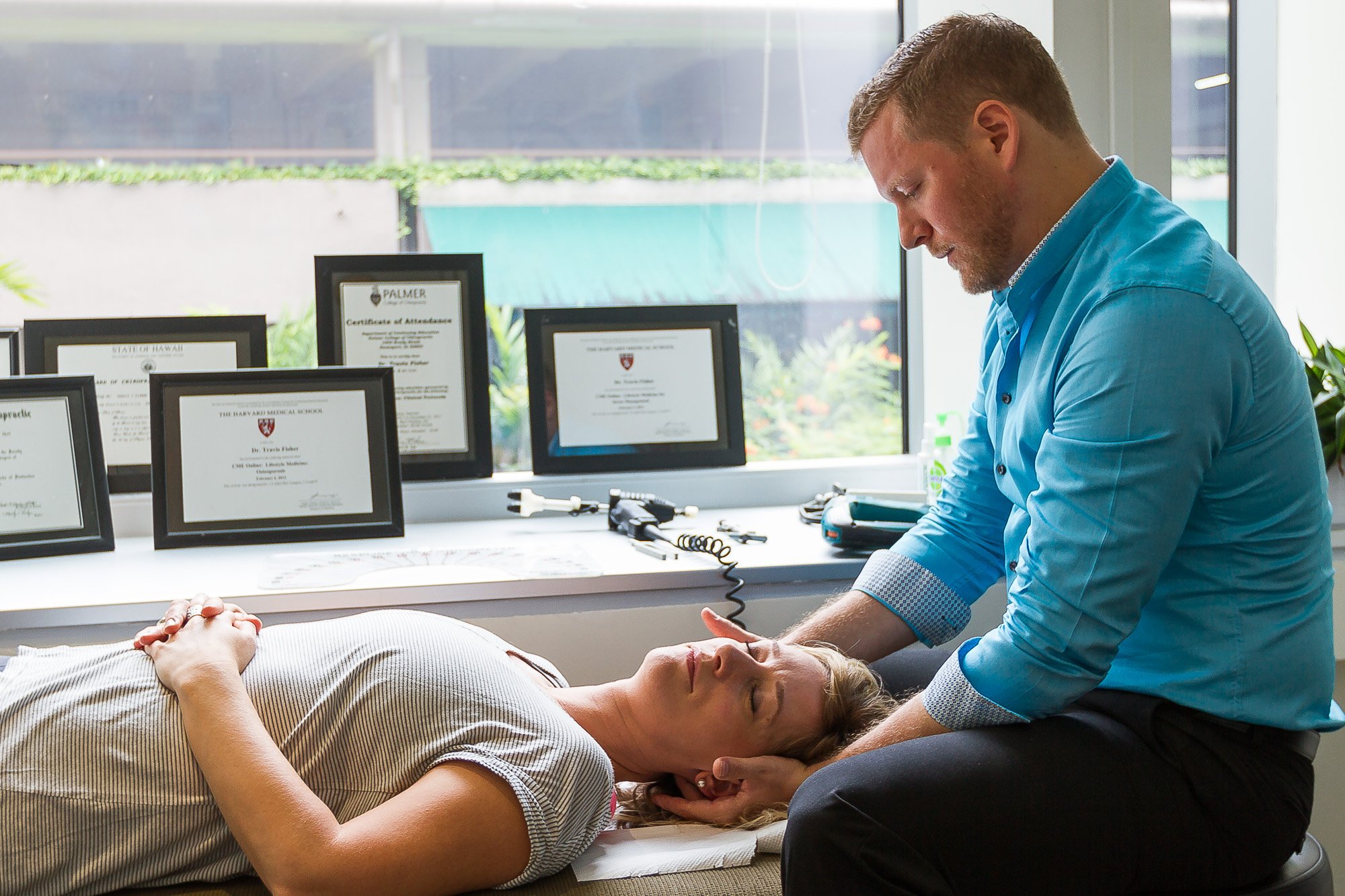 Portrait of Dr. Travis Fisher at LiveWell Chiropractic