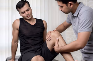 Sports chiropractor treating athletic injury