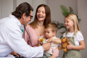 Mother with children at pediatric chiropractic appointment