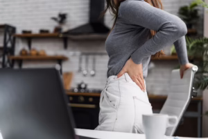 Person experiencing pain in the buttock and leg while standing or walking